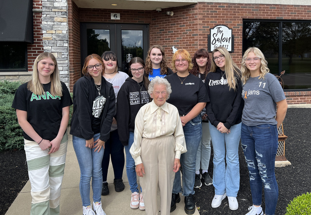Mrs. Virginia Shafer with senior cosmetology students at Upper Valley Career Center